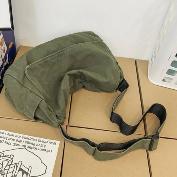 Female fabric hobo bag with slouchy design for students, ideal for school books and laptops as a casual messenger side pouch