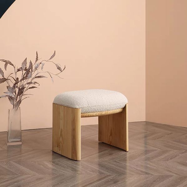Modern minimalist makeup stool with lamb cashmere upholstery and solid wood frame, ideal as a shoe changing bench or lounge footrest