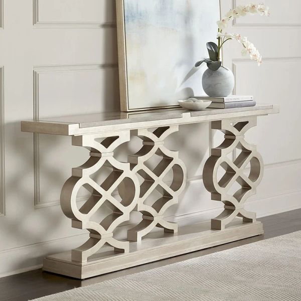Post-modern decorative cabinets in entrance halls divide old white sideboards