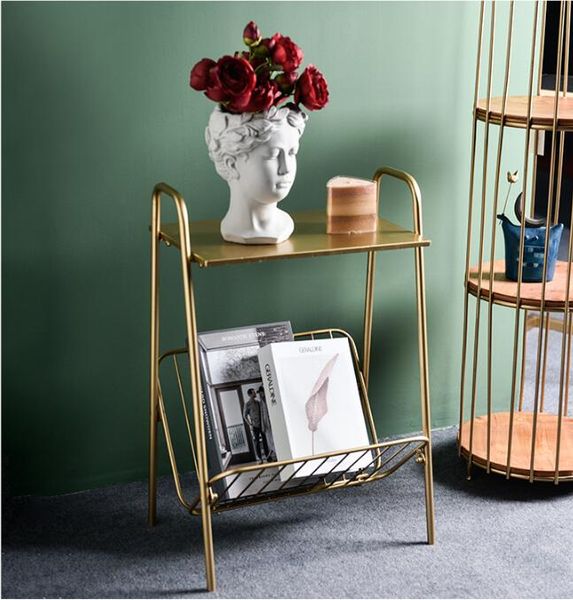 Sofa table with elegant lighting for stylish living room storage shelves featured in INS magazines
