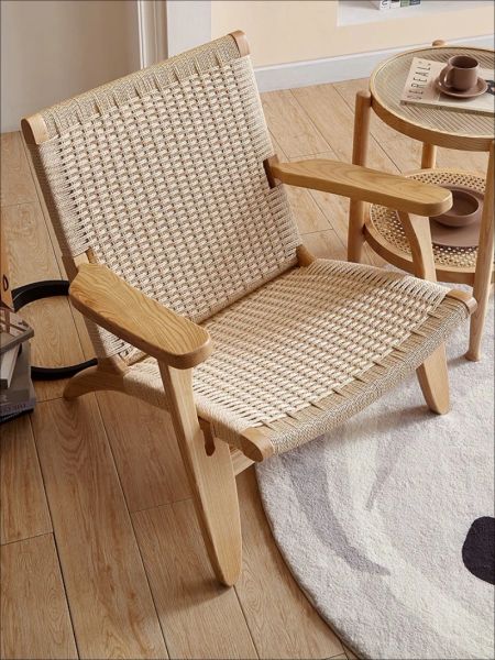 Solid wood rattan armchair for home, living room, balcony, or office conference room furniture - a simple, comfortable single sofa or lazy chair